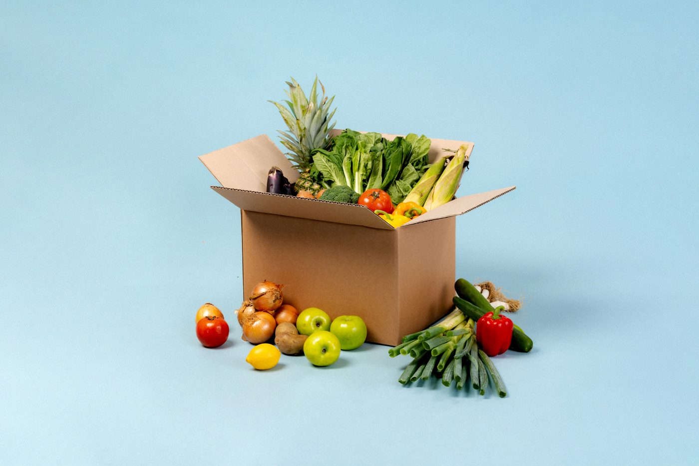 Box of fresh vegetables and fruit